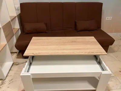 a coffee table in front of a couch at Apartamento El Alquimista in Cádiz