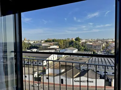 a view of a city from a balcony at Apartamento Alazán - Ole Solutions in Jerez de la Frontera