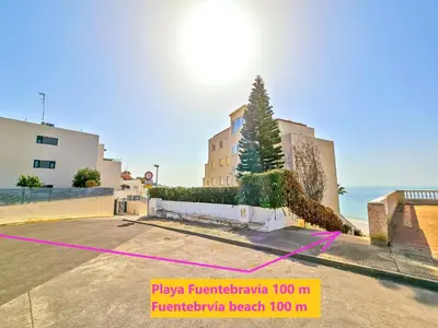 a parking lot in front of a building at Oceanfront Duplex with a Rooftop Pool and Terrace in El Puerto de Santa María
