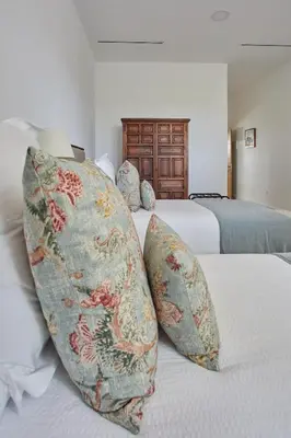 two pillows sitting on top of a bed at Finca La Fuensanta in Arcos de la Frontera
