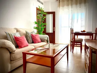 a living room with a couch and a coffee table at MyChoice Aitana in Rota