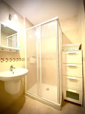 a bathroom with a shower and a sink at MyChoice Aitana in Rota