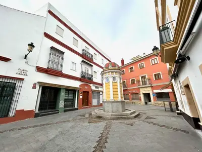 a clock tower in the middle of a street at GATU Guateque , 