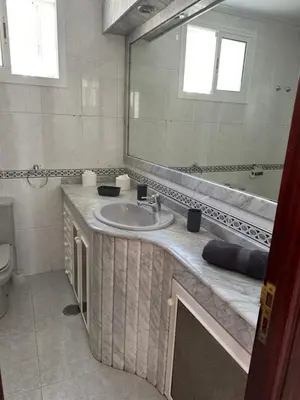 a bathroom with a sink and a mirror at Apartamento Vista-Beach in Cádiz