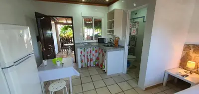 a small kitchen with a sink and a refrigerator at Estudios con piscina compartida en Complejo Rural el Mayorazgo in Cádiz