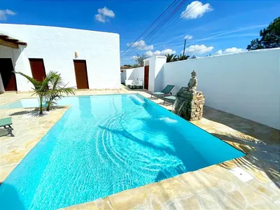 a swimming pool in the backyard of a house at GALDANA in Chiclana de la Frontera
