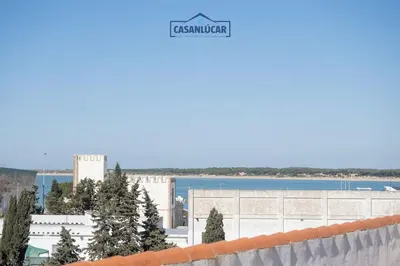 a view of the city from the roof of a building at Apartamento Cigüeña in Sanlúcar de Barrameda