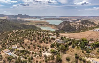 an aerial view of a valley with a lake and mountains at Pet Friendly Home In Algar in Algar