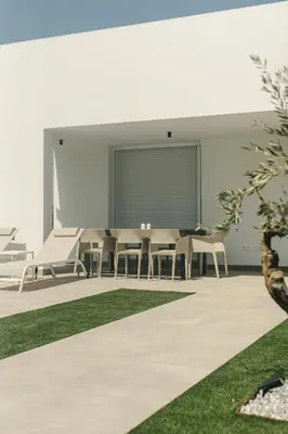 a living room with a table and chairs at Alda & Aljosía in Chiclana de la Frontera