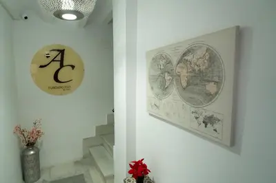 a white room with a picture on the wall at Apartamentos Consistorio Live in Jerez de la Frontera