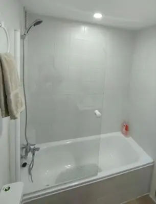 a shower with a glass door in a bathroom at Apartamento en Puerto de Santa María, Playa Las Redes in El Puerto de Santa María