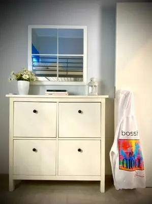 a dresser with a mirror on top of it at MyChoice Toledo in Rota