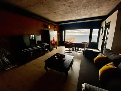 a living room with a couch and a table at El vigía de cadiz in Cádiz
