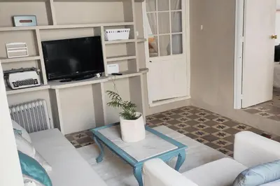 a living room with a couch and a table at Charming apartment in Arcos de la Frontera, 70 m² with balcony in Arcos de la Frontera