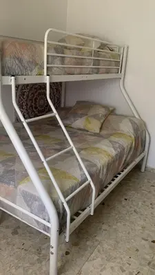 a couple of bunk beds in a room at Villa Irina in Chiclana de la Frontera
