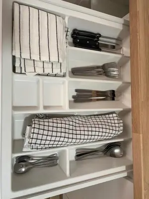 a white drawer with utensils in a kitchen at Apartamento La Saeta in Jerez de la Frontera