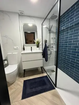 a bathroom with a toilet and a sink and a shower at Mirador de Sanlucar 9 in Sanlúcar de Barrameda