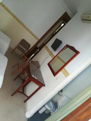 an overhead view of a room with a table and mirrors at Nuevo Hotel in Jerez de la Frontera