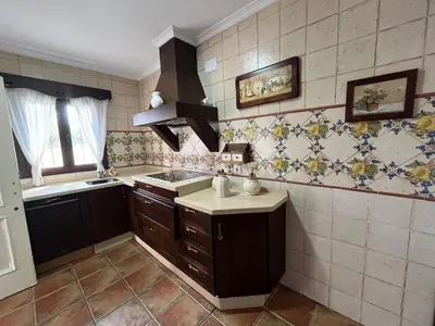 a kitchen with a sink and a counter top at VILLA ANDEMAR in Chiclana de la Frontera