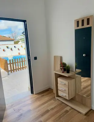 a room with a door leading to a balcony at Fantástico chalet con piscina 2 km de la barrosa in Chiclana de la Frontera
