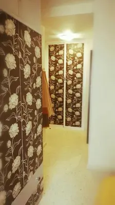 a hallway with a room with a wall of wine bottles at Centro Sanlúcar Barrameda/Cuesta Ganado in Sanlúcar de Barrameda