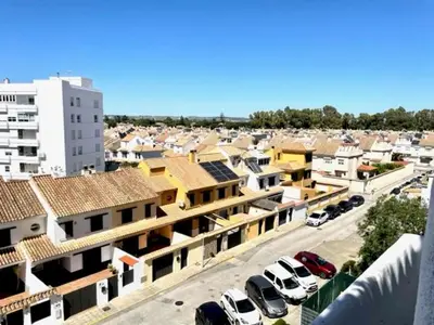 an aerial view of a parking lot in a city at GATU PREMIUM Villa Poniente, junto la playa de Valdelagrana 