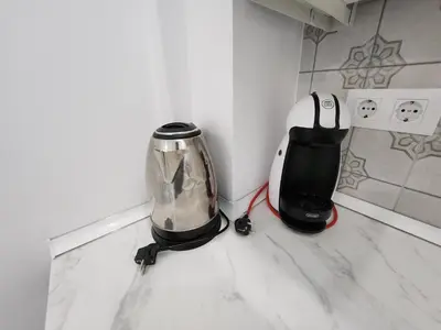 a toaster and a blender sitting on a kitchen counter at Allo Apartments 