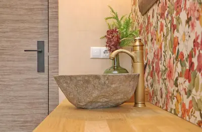 a sink in a bathroom with a counter top at Casa Aqua in El Guijo