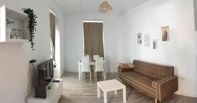 a living room with a couch and a table at Apartamento Cerrofuerte in Jerez de la Frontera