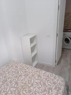 a living room with a couch and a table at Apartamento Cerrofuerte in Jerez de la Frontera