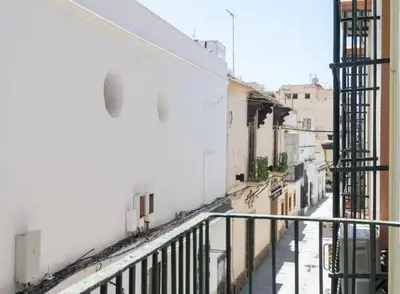 a view of a city street from a balcony at Apartoyou - Centro Histórico in El Puerto de Santa María