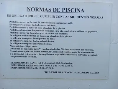 a typed document on top of a white wall at Relaxing Sanlúcar in Sanlúcar de Barrameda