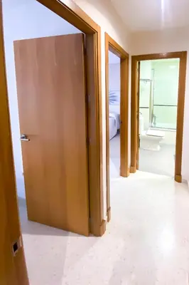 a room with a door leading to a bedroom at El rinconcito de la Isla in San Fernando