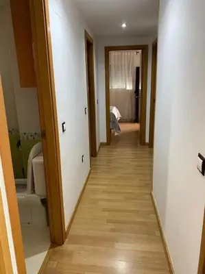 a hallway leading to a room with a hallwayngthngthngthngthngthngthngth at Sensacional piso en San Fernando in San Fernando