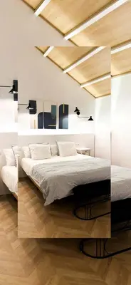 a bedroom with a large bed in a room at Apartamento Centro Cabildo Antiguo Convento in Sanlúcar de Barrameda