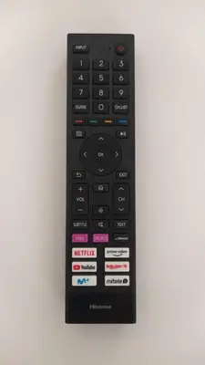 a black remote control on a white background at Sherryflat Fontana in Jerez de la Frontera