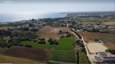 an aerial view of a park next to the water at Alojamiento Rural Al´Mare in Conil de la Frontera